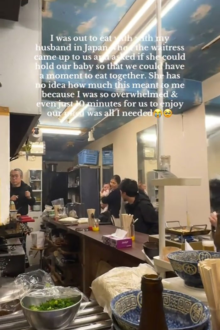 Japanese waitress helping a traveling mom and dad in a small restaurant, creating a viral heartwarming moment. Japanese waitress helping a traveling mom and dad in a small restaurant, creating a viral heartwarming moment.