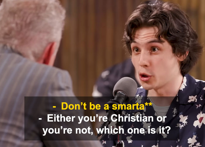 Young man speaking passionately into a microphone during a debate, highlighting Jordan Peterson brutally roasted in debate against atheists. Young man speaking passionately into a microphone during a debate, highlighting Jordan Peterson brutally roasted in debate against atheists.