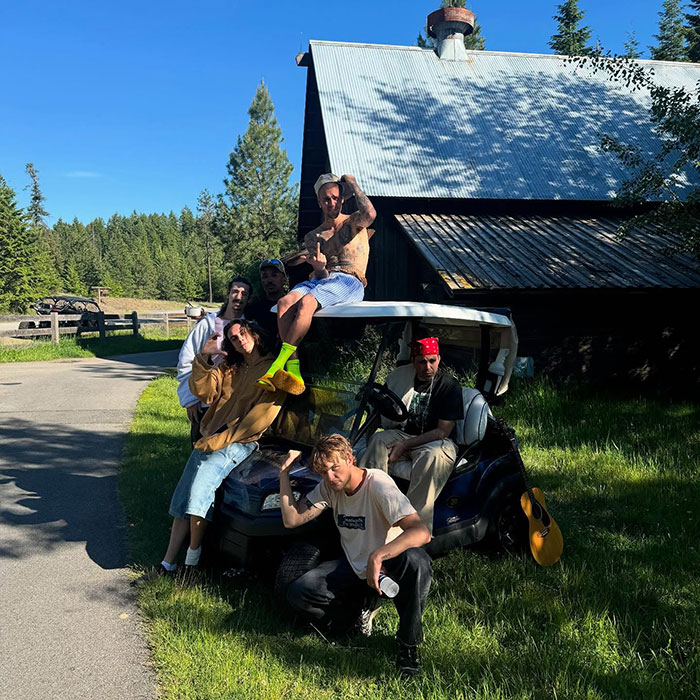 Justin Bieber and friends outside a cabin on a sunny day, sparking a fiery parenting debate over smoking. Justin Bieber and friends outside a cabin on a sunny day, sparking a fiery parenting debate over smoking.