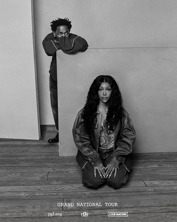 Kendrick Lamar posing with a woman in a black and white photo promoting his grand national tour and net worth.