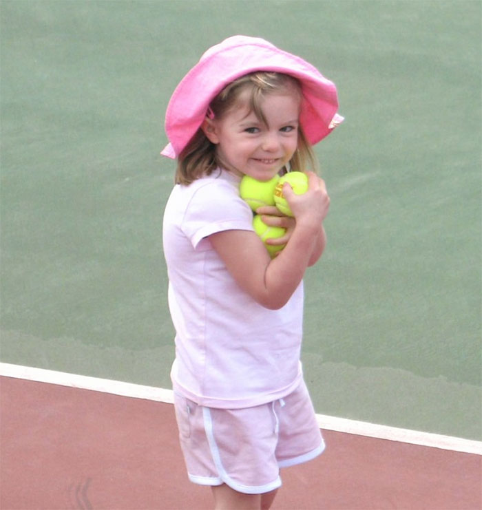 Young girl in pink hat and shorts holding tennis balls, representing Madeleine McCann suspect disturbing moment smirk. Young girl in pink hat and shorts holding tennis balls, representing Madeleine McCann suspect disturbing moment smirk.