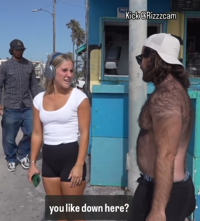 Woman confronts creepy influencer secretly filming with smart glasses outside near a blue structure on a sunny day. Woman confronts creepy influencer secretly filming with smart glasses outside near a blue structure on a sunny day.
