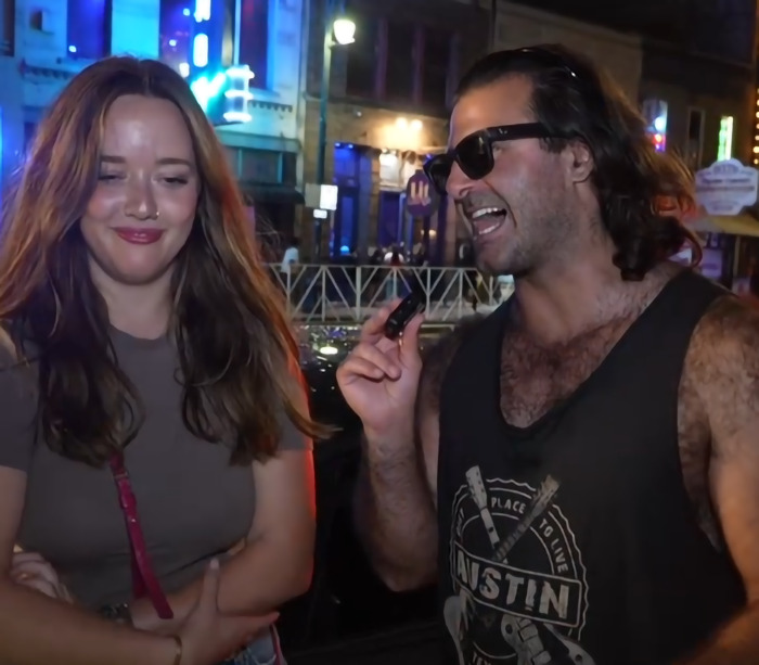 Man confronts creepy influencer secretly filming woman with smart glasses on a city street at night. Man confronts creepy influencer secretly filming woman with smart glasses on a city street at night.