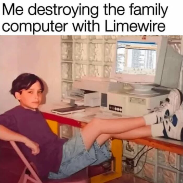 Young boy lounging beside an old family computer with Limewire open, evoking nostalgic memories of the good old days.
