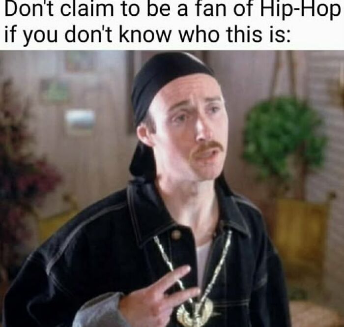 Man wearing a black durag and jacket making a peace sign, referencing nostalgic hip-hop culture in a meme format.