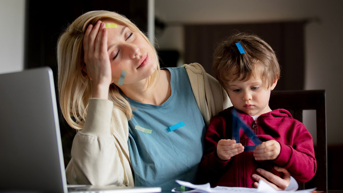 Tired woman babysitting young child at home, overwhelmed by neighbor demands and weekly babysitting responsibilities.