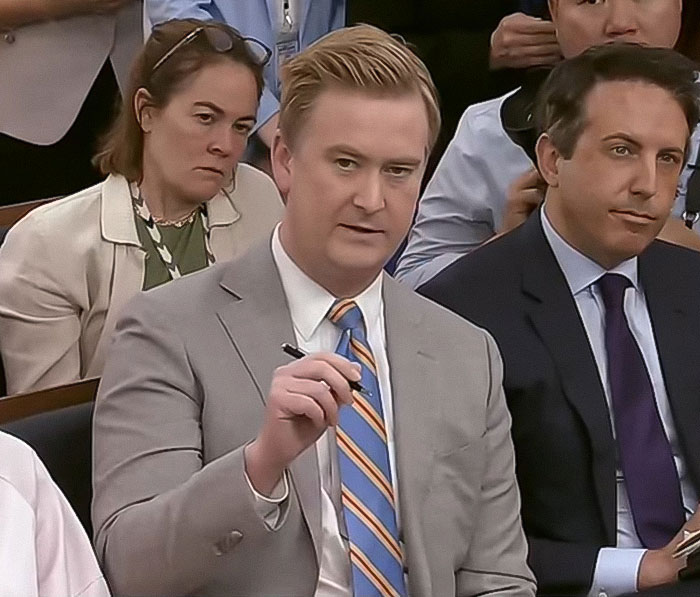 White House press briefing with a reporter in a gray suit discussing President Trump's comments on Taylor Swift. White House press briefing with a reporter in a gray suit discussing President Trump's comments on Taylor Swift.