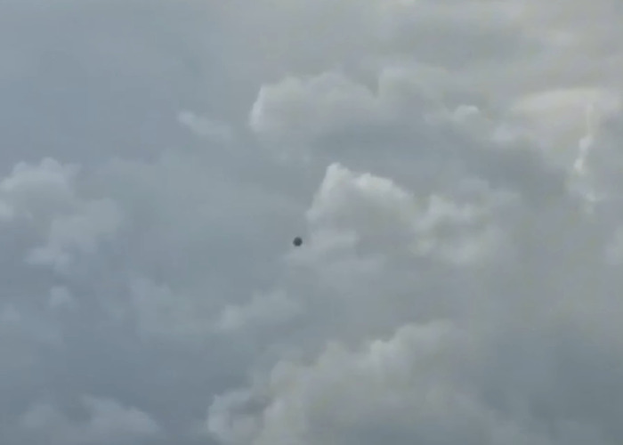 Dark UFO with ominous writing appears in cloudy sky, prompting scientists to break silence on origin of birth mystery. Dark UFO with ominous writing appears in cloudy sky, prompting scientists to break silence on origin of birth mystery.