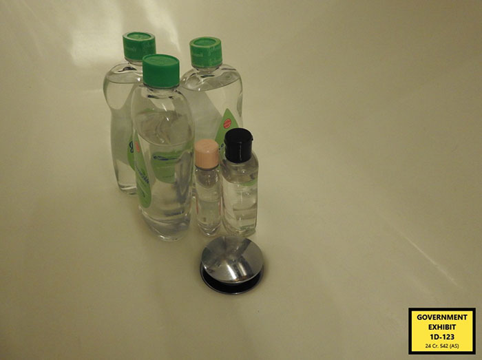Clear bottles of liquid on a surface, part of photos showing how Diddy prepared for Freak Off. Clear bottles of liquid on a surface, part of photos showing how Diddy prepared for Freak Off.