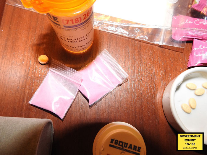 Prescription bottles and small bags of pink powder on a table showing preparation for Freak Off with Diddy. Prescription bottles and small bags of pink powder on a table showing preparation for Freak Off with Diddy.