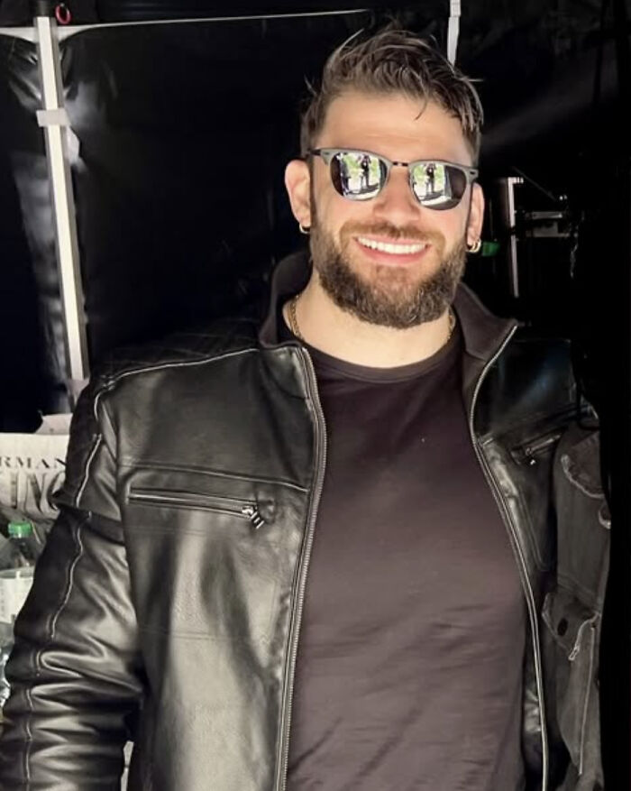 Actor who played Viktor Krum in Harry Potter wearing sunglasses and a black leather jacket, smiling at the camera. Actor who played Viktor Krum in Harry Potter wearing sunglasses and a black leather jacket, smiling at the camera.