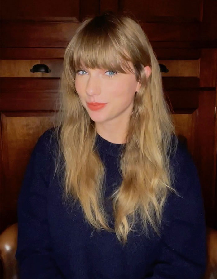 Taylor Swift with long blonde hair and blue eyes, posing indoors, related to Trump claims about her being no longer hot. Taylor Swift with long blonde hair and blue eyes, posing indoors, related to Trump claims about her being no longer hot.