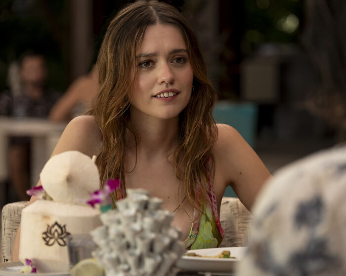 Aimee Lou Wood in a casual setting during a conversation related to Walton Goggins and feud questions. Aimee Lou Wood in a casual setting during a conversation related to Walton Goggins and feud questions.