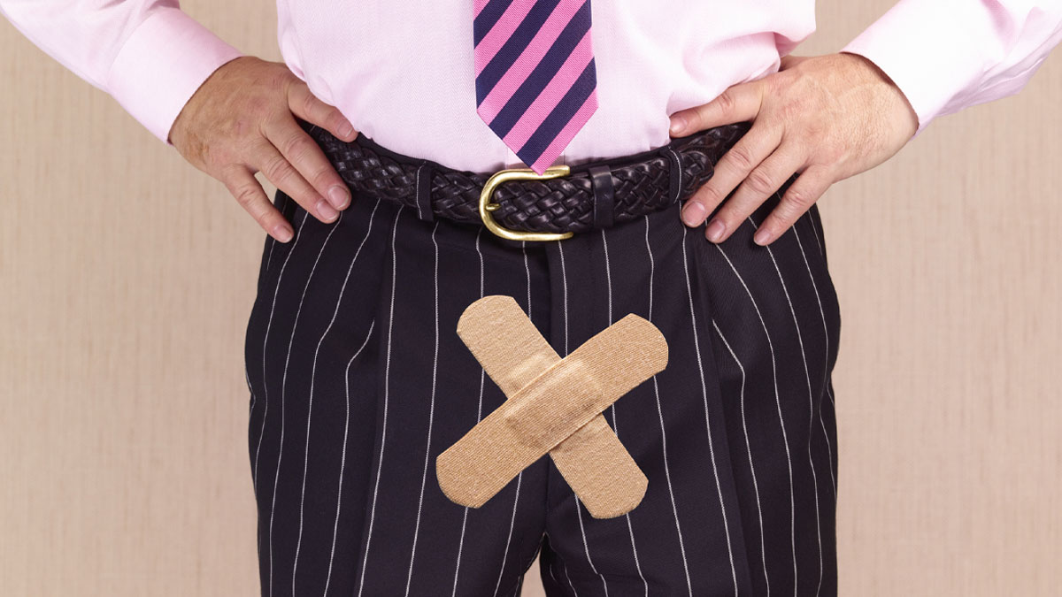 Man wearing striped pants with crossed bandages on groin area symbolizing vasectomy and possible pregnancy after procedure