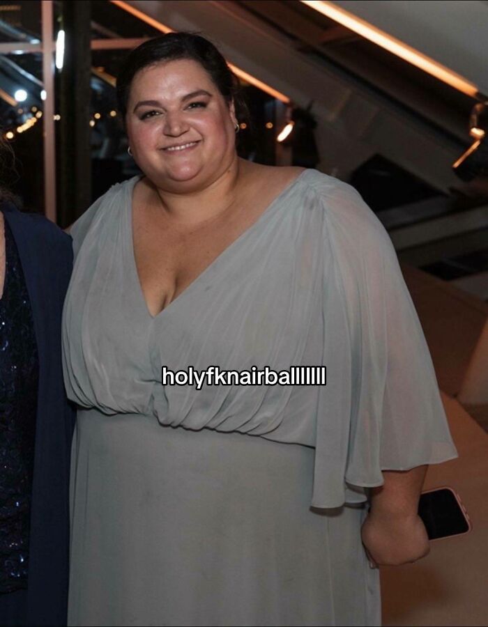 Smiling woman in a light gray dress, representing weight loss journey using Ozempic and sharing results online. Smiling woman in a light gray dress, representing weight loss journey using Ozempic and sharing results online.