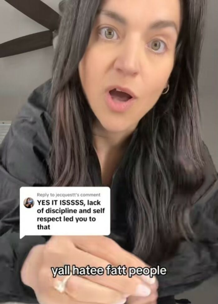 Woman with long dark hair reacting to online comments about weight loss using Ozempic, addressing opinions on fat people. Woman with long dark hair reacting to online comments about weight loss using Ozempic, addressing opinions on fat people.