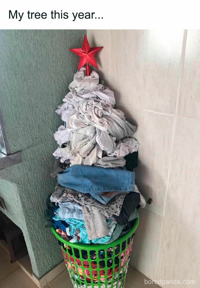 Laundry piled in a basket shaped like a Christmas tree with a red star on top, relatable memes for a laugh today