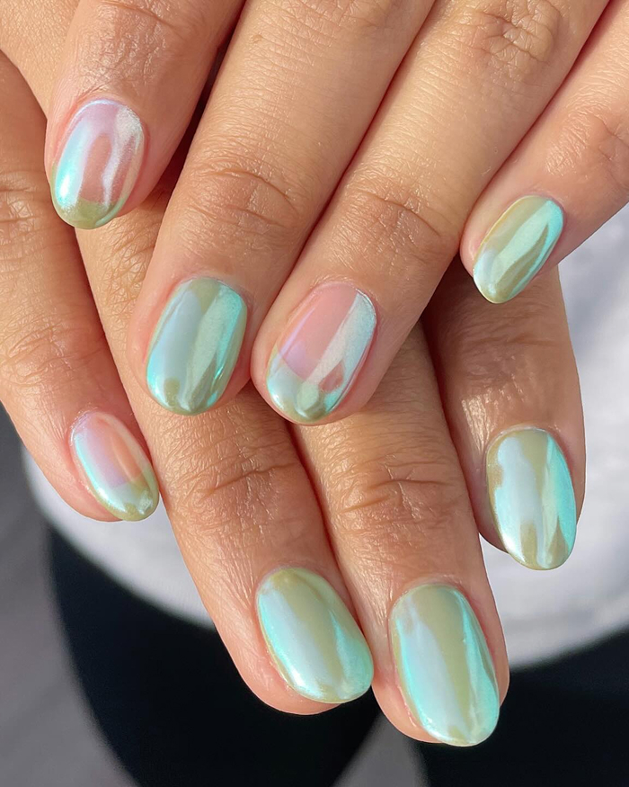 Close-up of iridescent summer nails with a glossy finish showcasing one of 2025’s hottest summer nails trends.