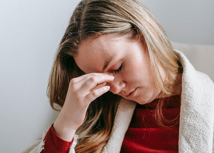 Woman feeling stressed and frustrated after neighbor says no to babysitting request from a stay at home mom Woman feeling stressed and frustrated after neighbor says no to babysitting request from a stay at home mom