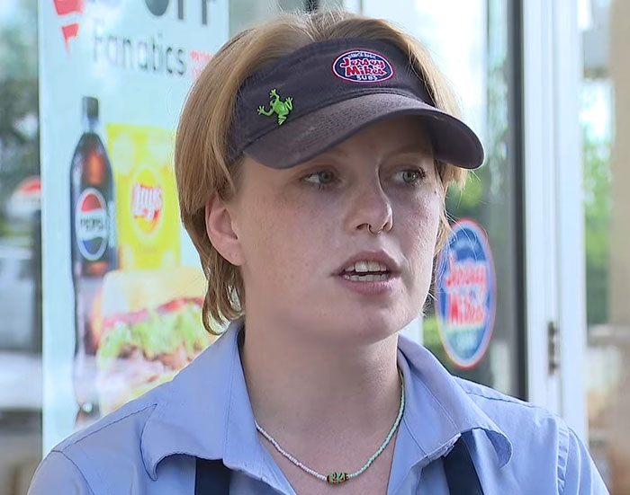 Jersey Mike's employee wearing uniform and visor, sharing story about captive woman's brave cry for help rescue. Jersey Mike's employee wearing uniform and visor, sharing story about captive woman's brave cry for help rescue.