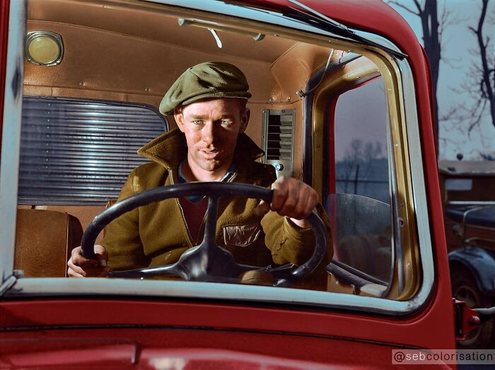 Colorized historical photo of a man driving a vintage truck, showcasing magical historical photos by talented viral artist.