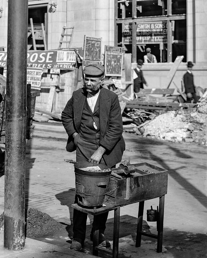 Colorized historical photo of a man working outdoors with a bucket and tools, capturing magical historical moments.