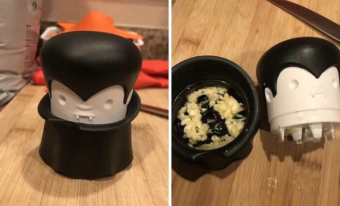 Vampire-shaped garlic press on wooden countertop, showcasing best-selling kitchen items for easy food preparation.