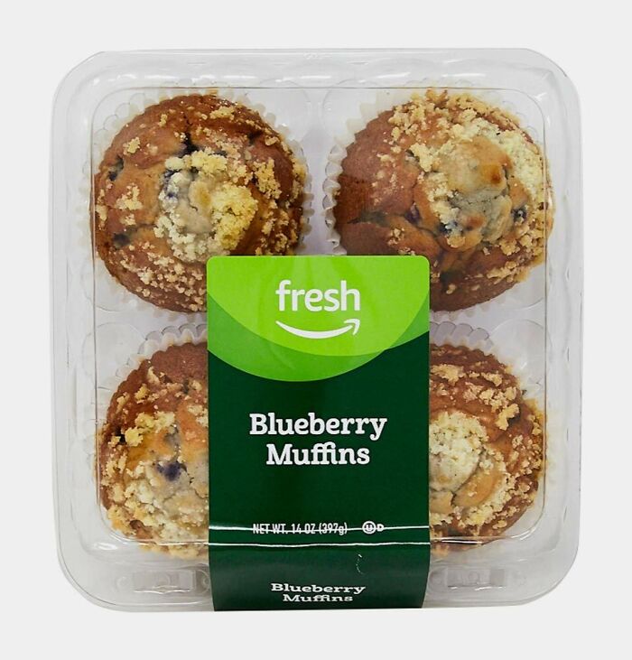 Amazon Fresh blueberry muffins in clear packaging, showcasing affordable grocery staples cheaper than big box stores.