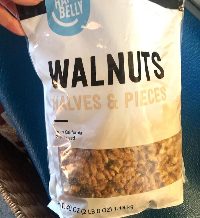 Bag of walnuts halves and pieces from Amazon Fresh, highlighting staples that are cheaper than big box stores.