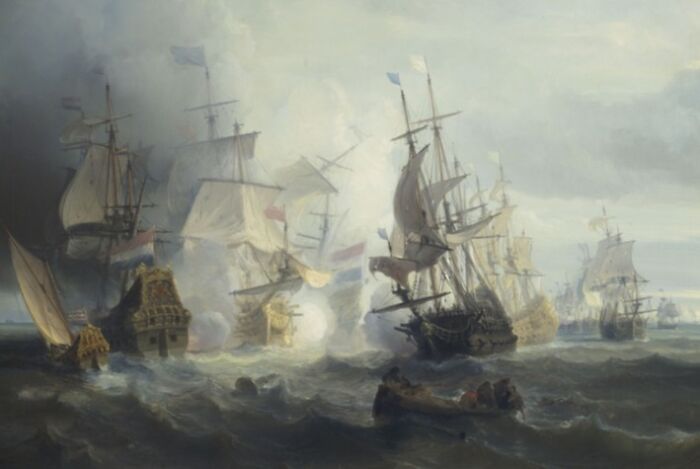Historical naval battle scene with sailing ships engulfed in smoke and turbulent sea waves, illustrating historical facts.