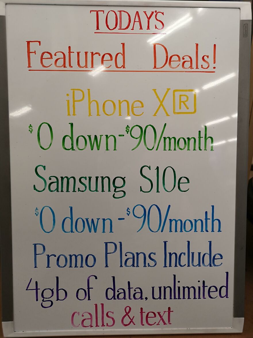 Handwritten whiteboard showing phone deals for iPhone XR and Samsung S10e with colorful, perfect handwriting examples.