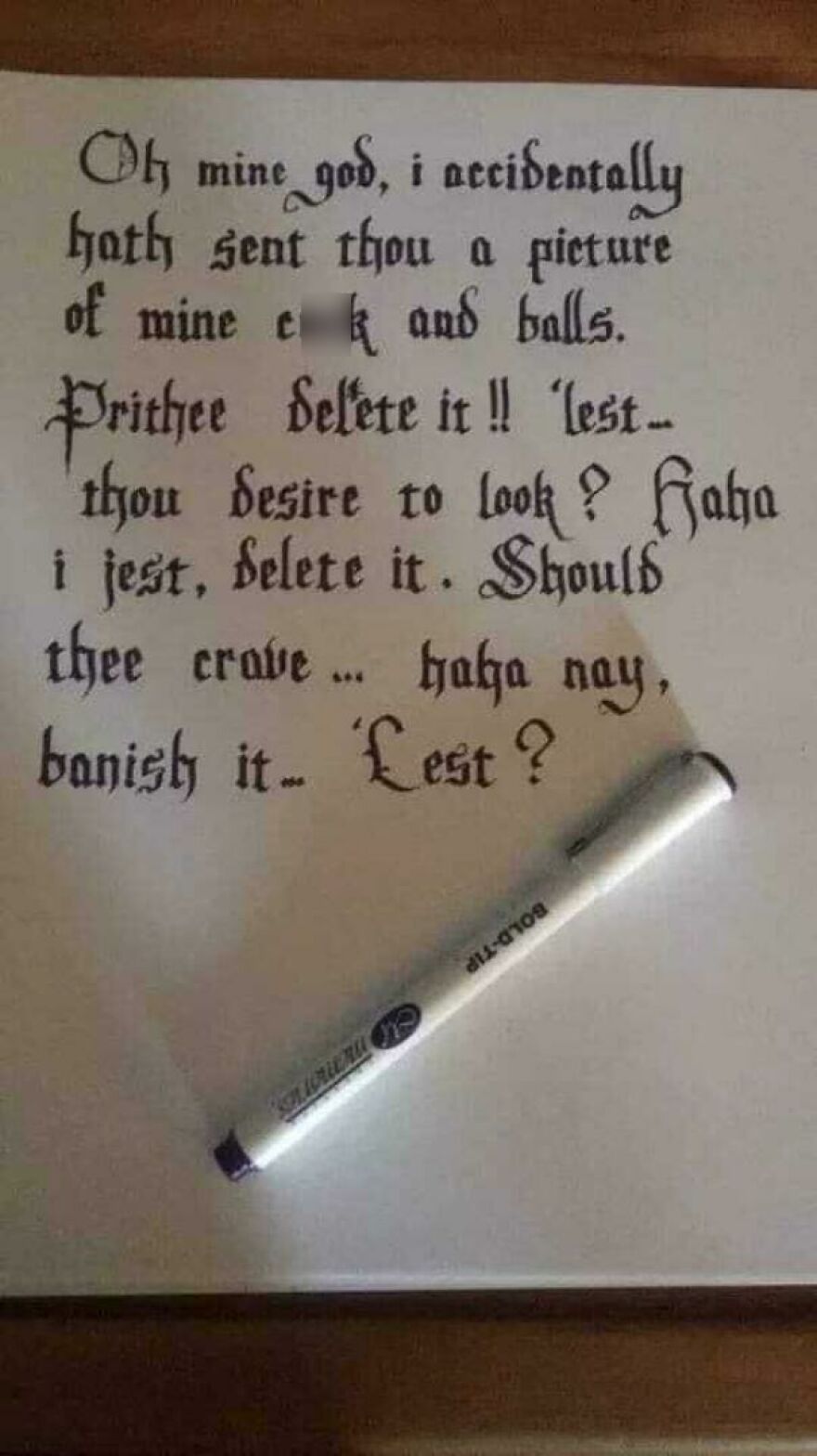 Handwritten note in elaborate calligraphy style showing a humorous message with a black pen on white paper.
