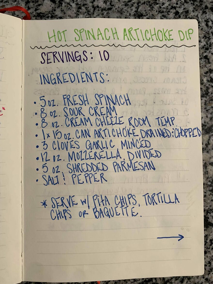 Handwritten recipe for hot spinach artichoke dip showing perfect handwriting examples in a neat notebook page.