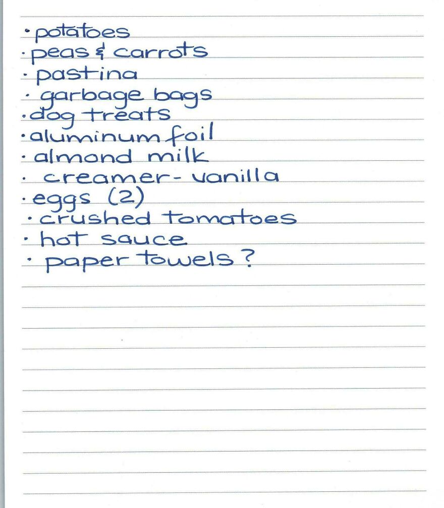 Handwritten grocery list showcasing perfect handwriting examples with clear, neat, and legible blue ink on lined paper.