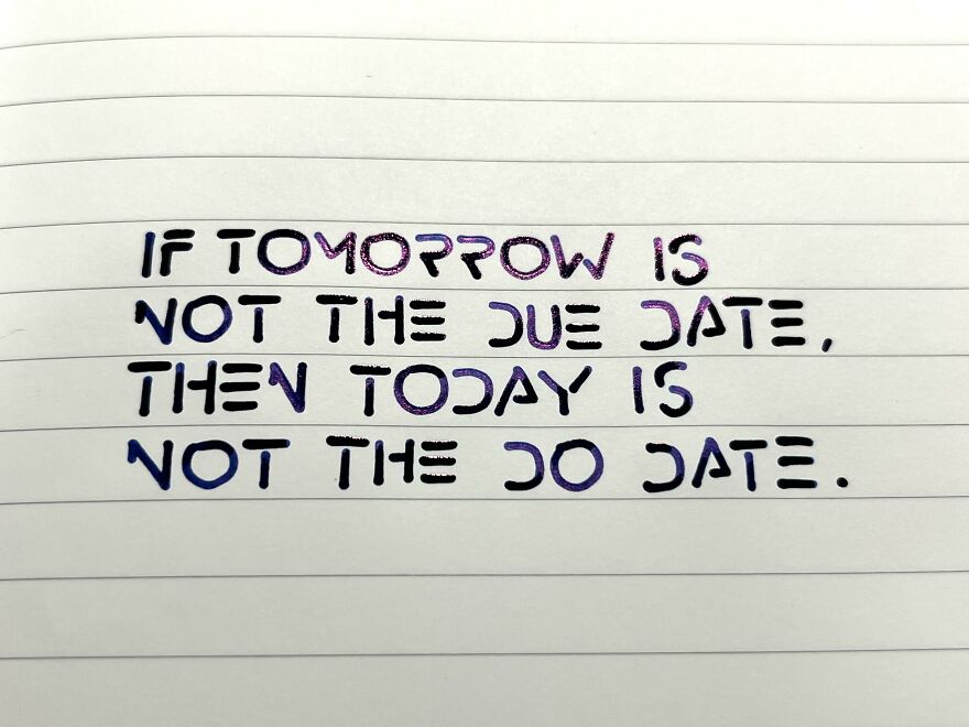 Handwriting example with neatly written motivational quote on lined paper showcasing perfect handwriting style.