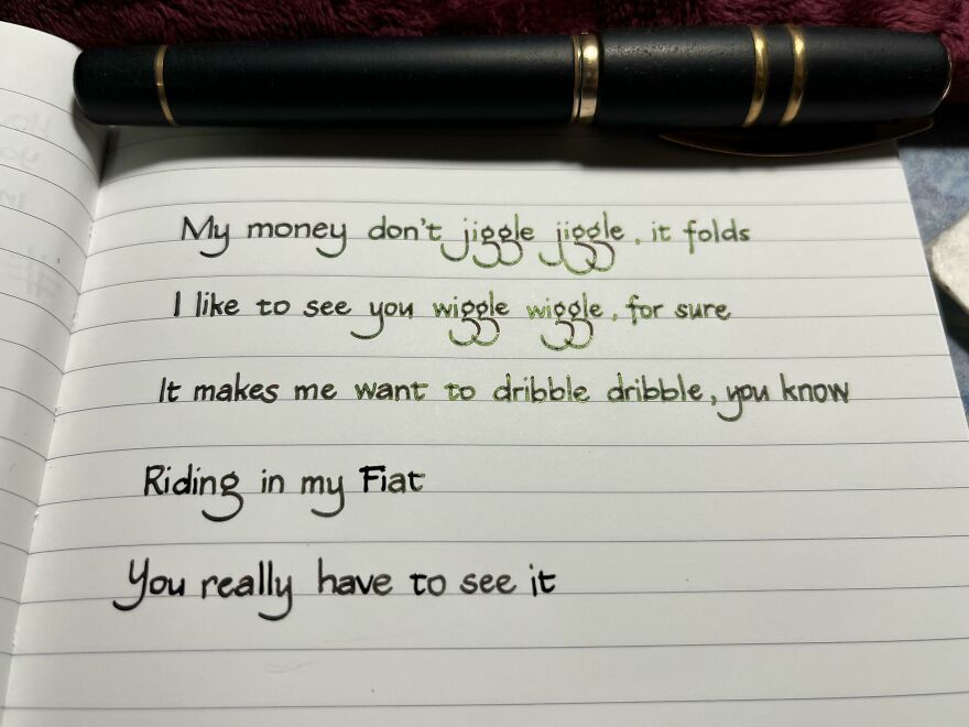 Handwriting example featuring neat, creative cursive and print styles written with a black and gold pen on lined paper.