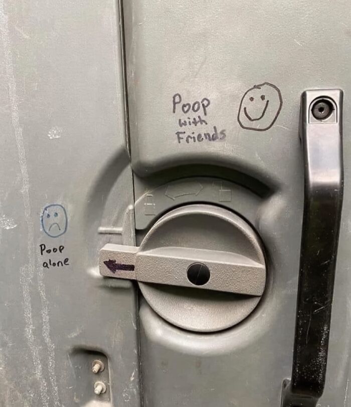 Graffiti on a restroom lock showing sad and happy faces with captions humorously about p**p alone and with friends, funny memes.