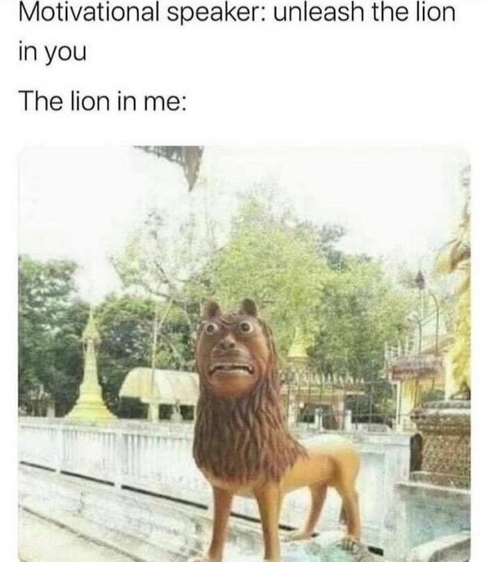 Statue of a lion with a funny startled expression in an outdoor setting, perfect for funniest memes and humor content.