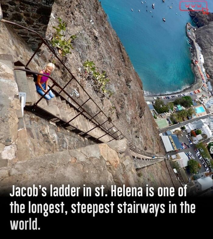 Steep death stairs of Jacob's ladder in St. Helena showing a dangerously angled stone stairway with a person sitting midway.