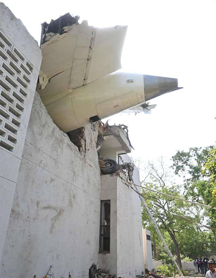 Plane crash causing severe building damage with people investigating the unusual take-off and suspected evil intent. Plane crash causing severe building damage with people investigating the unusual take-off and suspected evil intent.