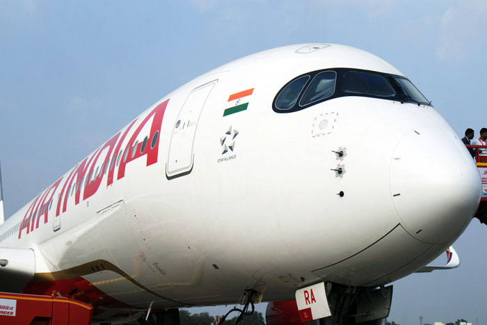 Close-up of Air India airplane nose during unusual take-off amid expert concerns of evil intent after plane crash. Close-up of Air India airplane nose during unusual take-off amid expert concerns of evil intent after plane crash.