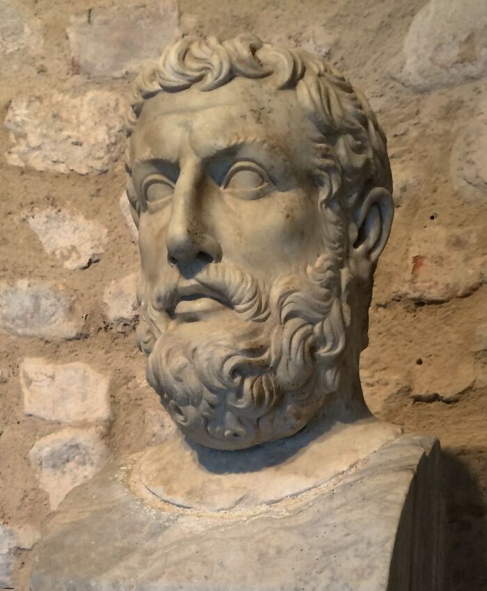 Marble bust of an ancient bearded man representing fascinating theories about the afterlife in historical context.