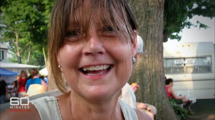 Close-up of woman smiling outdoors, showing her face 16 years after a chimpanzee attack and subsequent face transplant. Close-up of woman smiling outdoors, showing her face 16 years after a chimpanzee attack and subsequent face transplant.