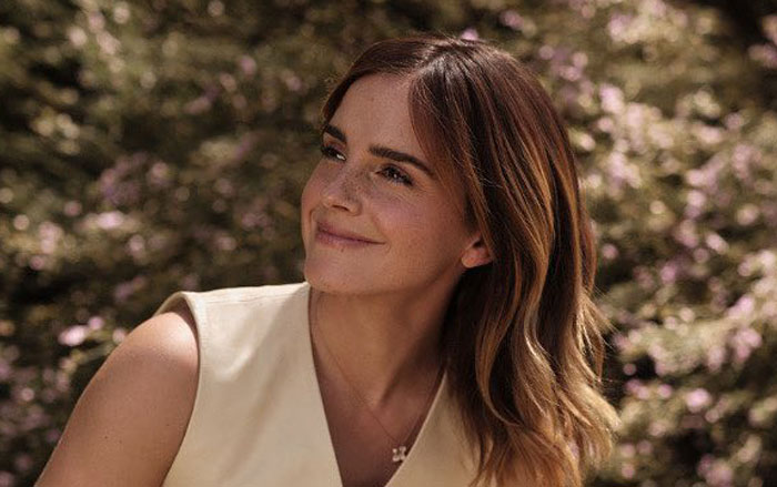 Emma Watson outdoors smiling, discussing Harry Potter and reactions to the controversial incest scene in a recent interview. Emma Watson outdoors smiling, discussing Harry Potter and reactions to the controversial incest scene in a recent interview.