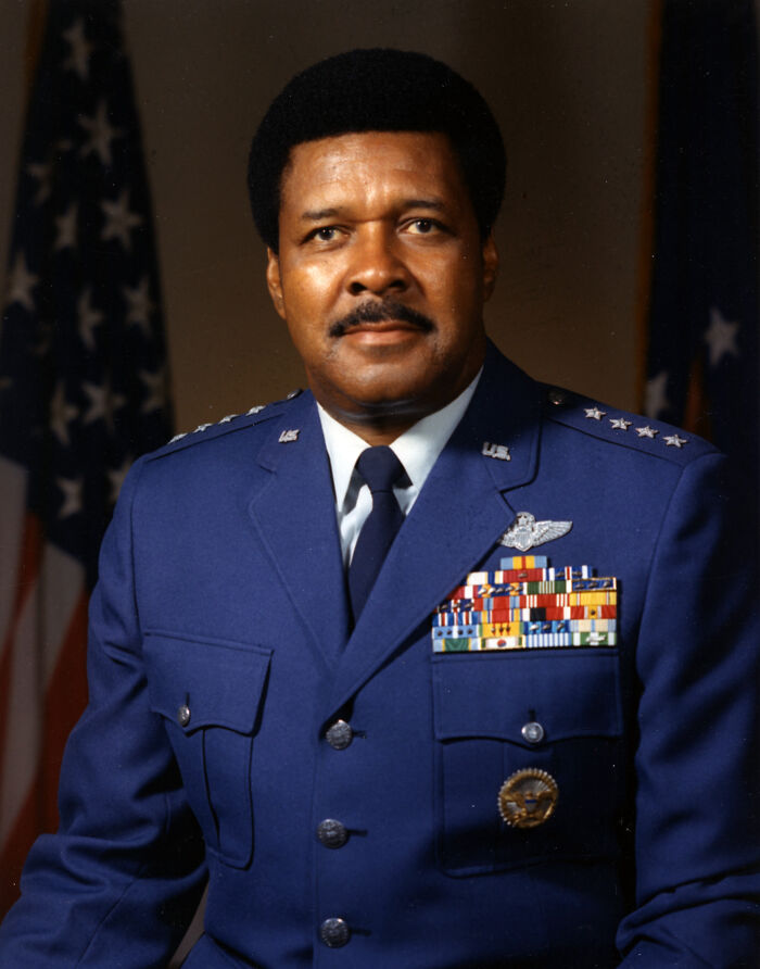 African American military officer in formal uniform with medals, representing African American military history and achievements.