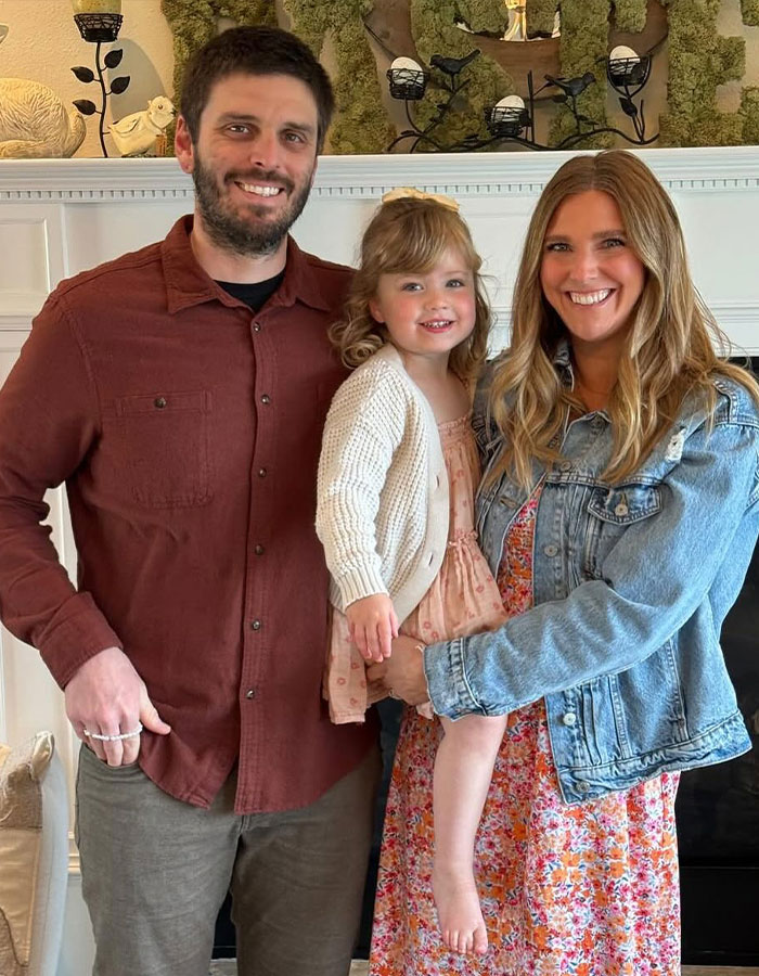 Family portrait of parents with young child, illustrating Real Housewives exec and their two children at home. Family portrait of parents with young child, illustrating Real Housewives exec and their two children at home.