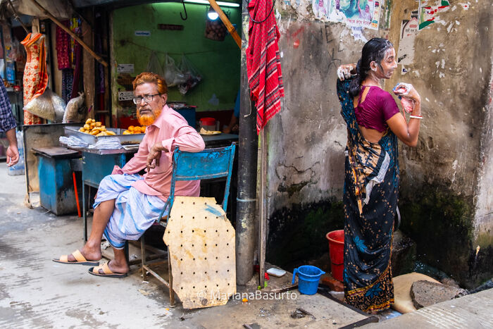 Street scene showing daily life and unseen realities captured by photographer in vibrant, candid world photography shots.