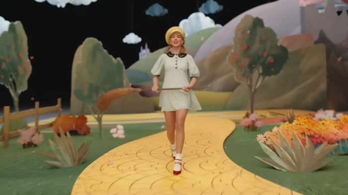 Taylor Swift as Dorothy on the yellow brick road set in the new Wicked movie, fans react to her silent role. Taylor Swift as Dorothy on the yellow brick road set in the new Wicked movie, fans react to her silent role.