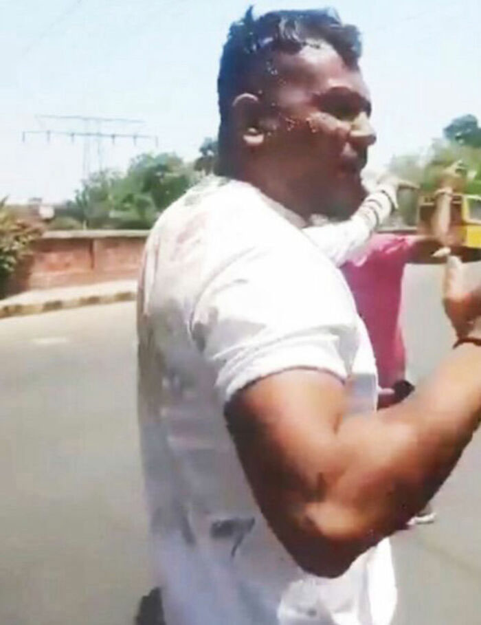 Man speaking outdoors, expressing emotions related to Air India survivor's story and survivor's guilt experience. Man speaking outdoors, expressing emotions related to Air India survivor's story and survivor's guilt experience.