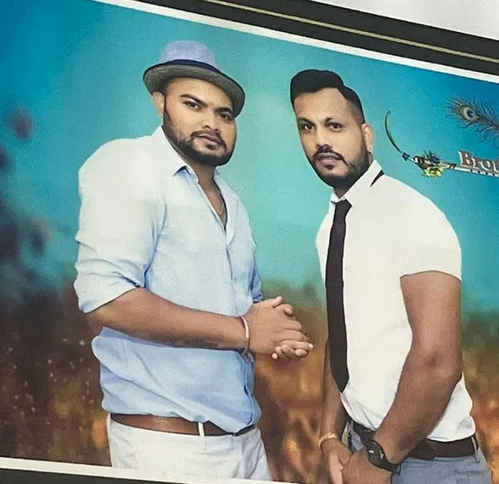 Two men posing together, representing Air India survivor and his brother, highlighting survivor's guilt story. Two men posing together, representing Air India survivor and his brother, highlighting survivor's guilt story.